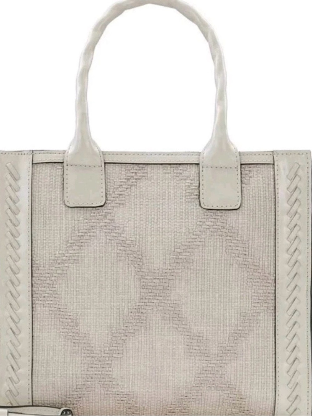 Patricia Nash curry latte leather tote features a distinct woven herringbone des